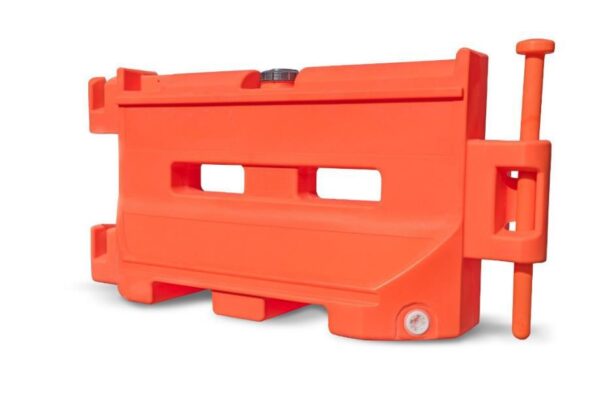 A red plastic barrier is shown with the side of it.